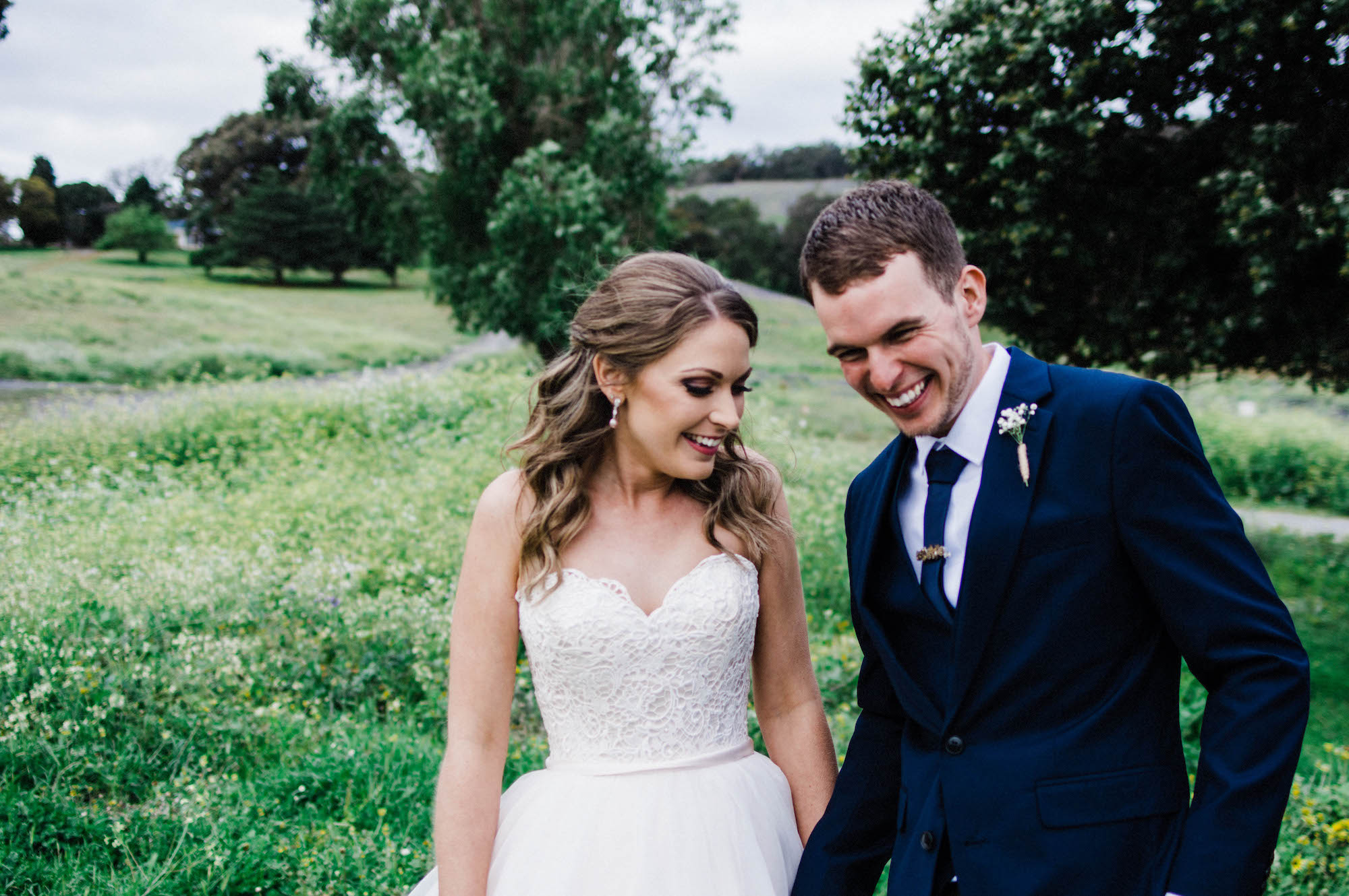 The bride & groom smile together during their wedding portraits in Byford, Australia.