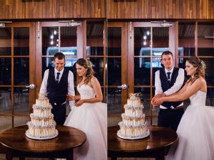 Wedding photography of the bride & groom cutting the cake at Quarry Farm.
