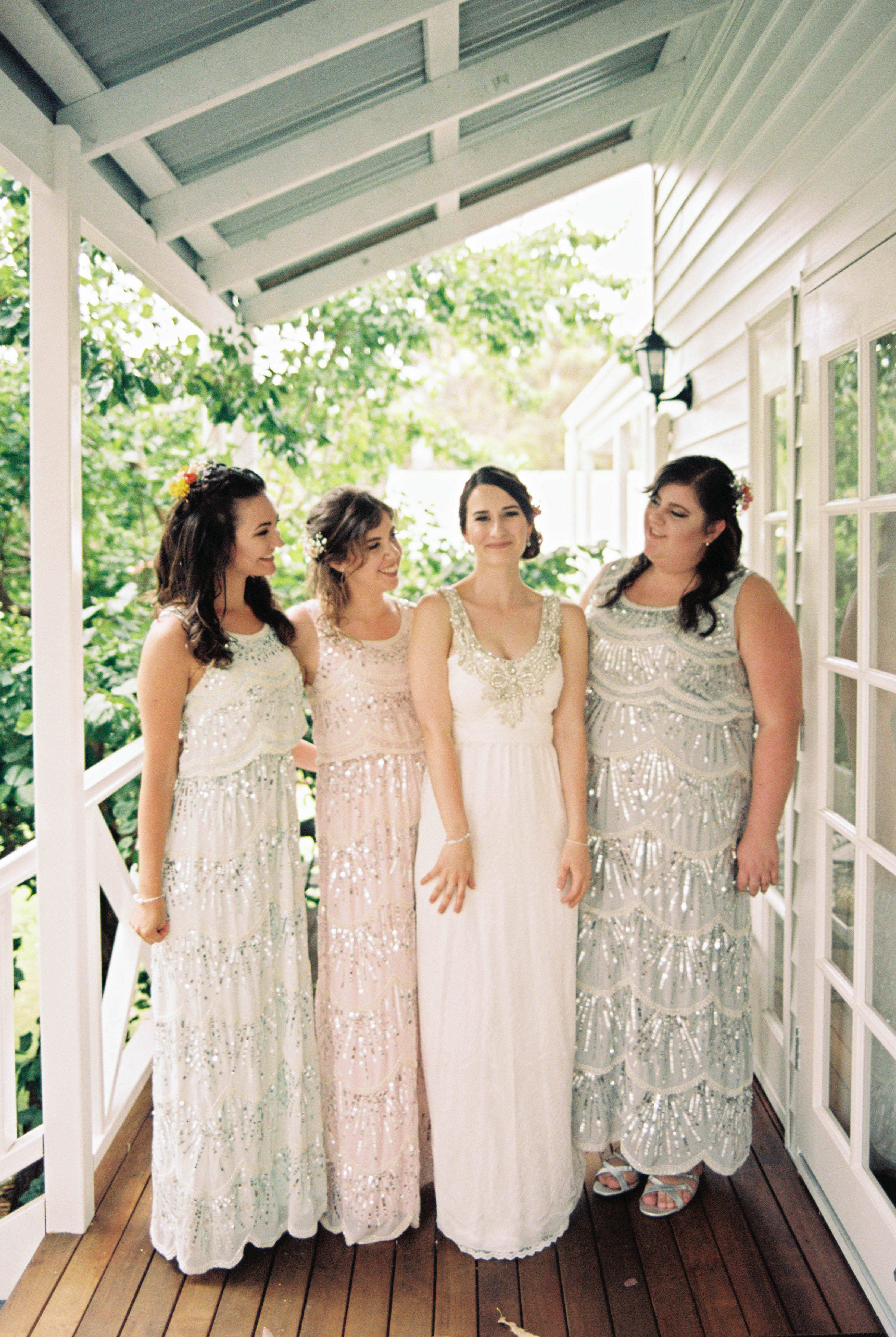 A photo of the bride and her bridesmaids the morning of her South West Destination Wedding taken by Rhianna May Italy and Australia Destination Wedding photographer