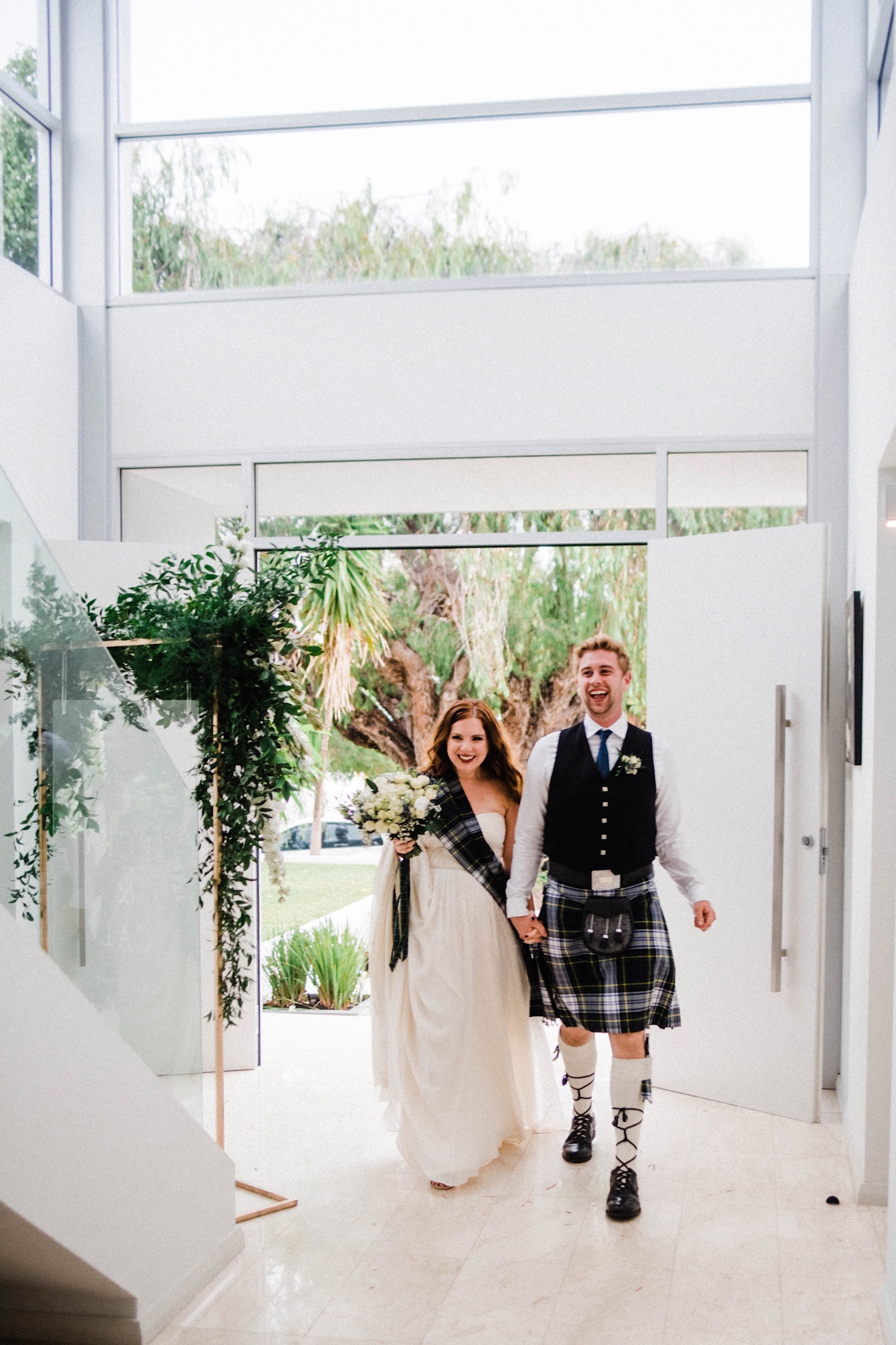 Documentary Wedding Photography of Becky & Cal arriving at their Sustainable Backyard Wedding.