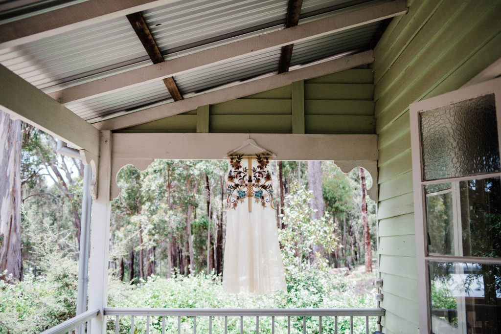 A sheer, embroidered dress made sustainably by Harriette Gordon taken at Donnelly River.